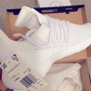 All white Adidas Sneakers